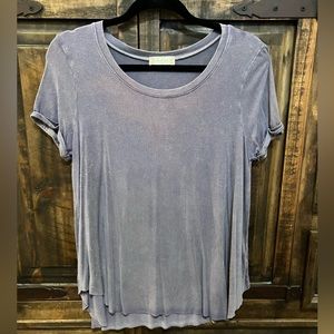 medium, purple shirt